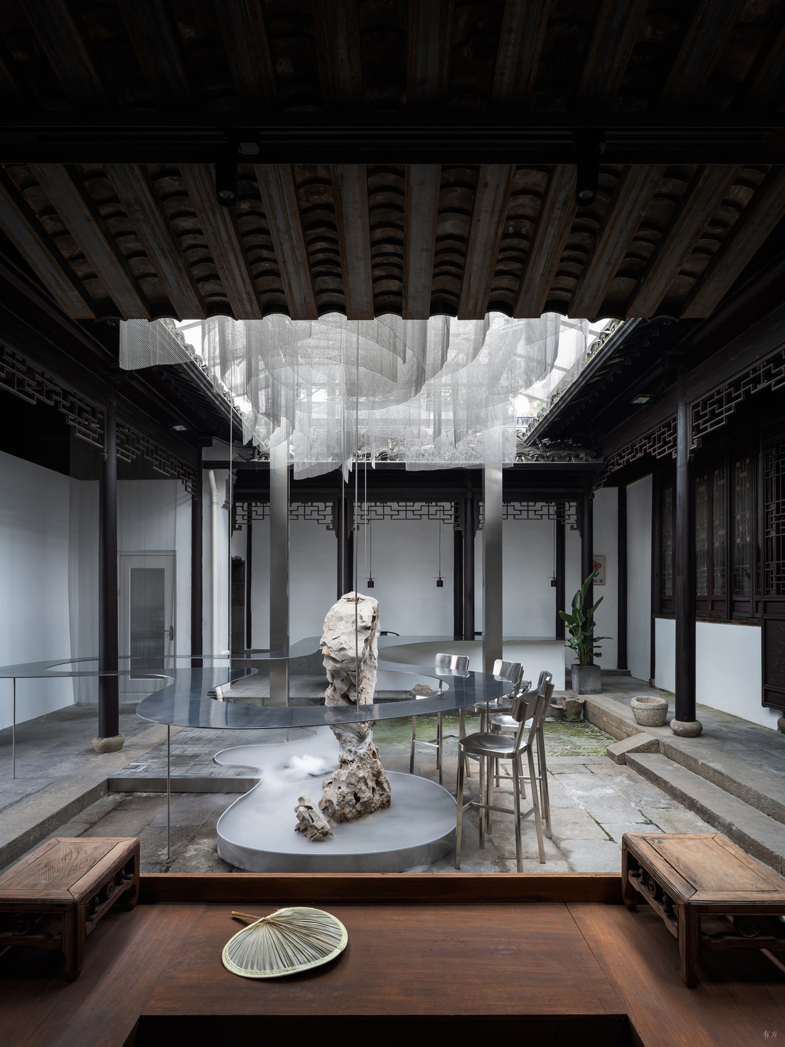 Completed Huarong tea space set within a traditional Suzhou courtyard