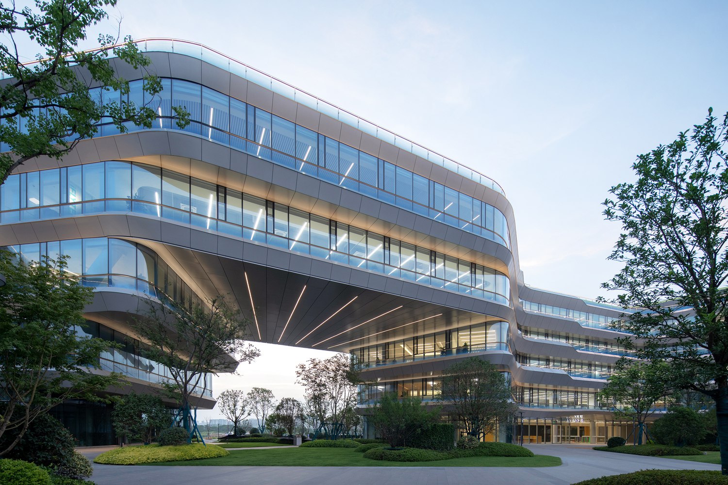 Exterior view beneath the entrance canopy of the iFlytek Headquarters in Hefei